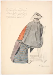 Siedząca żona widziana z tyłu