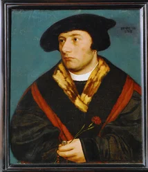 Portret mężczyzny w wieku 25 lat, trzymającego w dłoni goździk ...