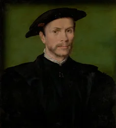 Portret brodatego mężczyzny w czerni.