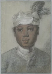 Głowa młodego czarnego mężczyzny w turbanie z piórami