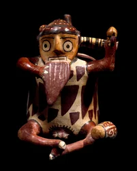 Sztuka przedkolumbijska, cywilizacja Nazca: antropomorficzna waza przedstawiająca muzyka grającego na flecie pana. 100 pne-800 ne. Lima, Muzeum Archeologiczne