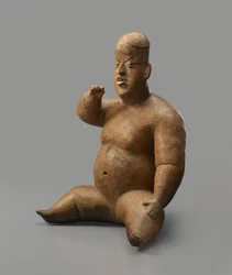 Siedząca figurka (ceramiczna z poślizgiem)