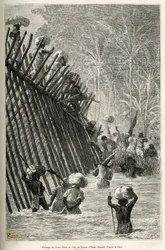 Przejście ekspedycji przez rzekę Lovoi (lub rzekę diabła) (region Katanga, Kongo), rys. Emile Bayard, aby zilustrować podróż przez Afrykę, z Zanzibaru (Tanzania) do Bengueli (Angola), w latach 1873-1876 , przez brytyjskiego dowódcę V.L.
