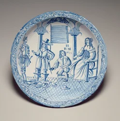 Naczynie z siedzącą królową Katarzyną z butem założonym przez klęczącego kawalera, 1677 (ceramika glazurowana cyną)