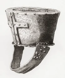 Hełm z zamku Pomeroy w Anglii, pochodzący z ok. XII wieku, z książki The British Army: Its Origins, Progress and Equipment, opublikowanej w 1868 r.