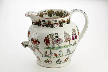 Dzbanek Staffordshire ozdobiony figurami Arlekina i motywem karnawałowym, 1866 (porcelana z Ironstone)