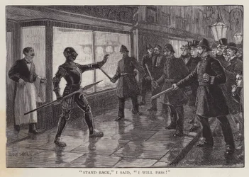 Policjant skonfrontowany z mężczyzną w średniowiecznej zbroi na londyńskiej ulicy (lito)