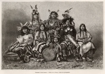 Indyjscy wojownicy i ich żony (Teksas). Grawer na podstawie rysunku E.Ronjata, aby zilustrować historię La conquete blanche, autorstwa Williama Hepwortha Dixona, w 1875 r., opublikowany w „” Le tour du monde””” 1876, pod redakcją Edouarda Chartona, wydanie