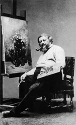 Gustave Courbet (1819-1877), francuski malarz w swojej pracowni, ok. 1876 r., fot. Etienne Carjat