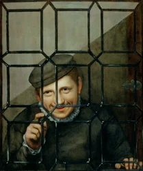 Chłopiec patrzący przez okno skrzynkowe