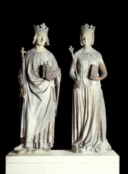Art France: Posągi króla Francji Karola V znanego jako Karol Mądry (1338-1380) i królowej Francji Jeanne de Bourbon (1337-1378). Rzeźba w wapieniu z XIV wieku. Prawdopodobnie z fasady wschodniego wejścia do Luwru (dekor