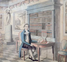 Pan czyta w swojej bibliotece