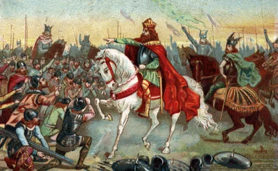 Historia Galii w średniowieczu: sasi germańscy klęczą przed królem Karolem Wielkim (742-814), który wygrał wojny. Chromolitografia z końca XIX wieku.