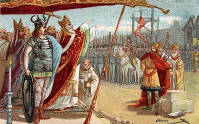 Król Dagobert I (605-639), król Franków Merowingów, w latach 629-634 kładzie pierwszy kamień pod Bazylikę Świętego Denisa (Saint Denis) w obecności Świętego Eloi. Chromolitografia z końca XIX wieku.