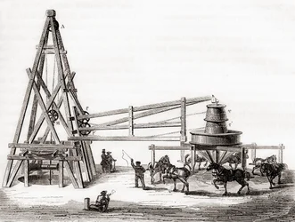Robotnicy używający karuzeli i wciągarki do wiercenia studni artezyjskich w Grenelle we Francji w XIX wieku, z „Les Merveilles de la Science”, opublikowanej ok. 1870 r. (rycina)