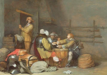 Żołnierze grają w karty w wartowni