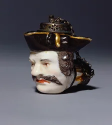 Misa portretowa z fajką miśnieńską, wzorowana na głowie Schmiedla, ok. 1750 (porcelana)