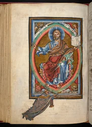 Arundel 156, f.99v, Chrystus zasiada na tronie w majestacie w mandorli, otoczony czterema symbolami Ewangelistów, z „Graduału, Sekwentarza i Sakramentarza” (welum)