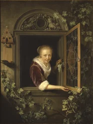 Młoda kobieta przy oknie z kiścią winogron, 1622