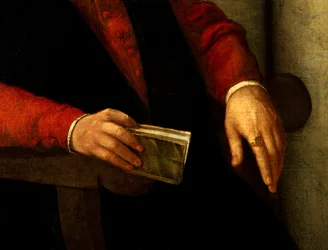 Przypuszczalny portret Francois Rabelais (1494-1553), francuskiego pisarza i lekarza. Fragment księgi, którą trzyma w dłoni i rycerza, który nosi na palcu. Obraz Giovanniego Battisty Moroniego (1525-1578)
