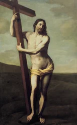 Zmartwychwstały Chrystus objęty krzyżem