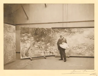 Claude Monet (1840-1926) przed obrazami „Lilie wodne”, w swoim studio w Giverny
