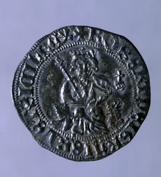 Srebrna moneta wybita w czasach króla Neapolu Roberta I Anjou (1275-1343).