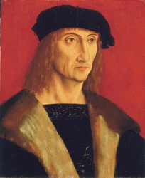 Portret mężczyzny w futrzanym płaszczu, złotym łańcuszku i czarnym berecie na czerwonym tle