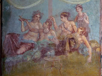 Fresk przedstawiający rzymską klasę wyższą w luksusie cieszącą się życiem odkryty w Pompejach. Pompeje, Włochy.