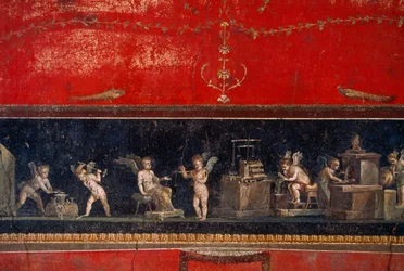 Fresk odkryty w Pompejach przedstawia złotnicze cherubiny przy pracy. Pompeje, Włochy.