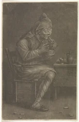 Mężczyzna zapala fajkę