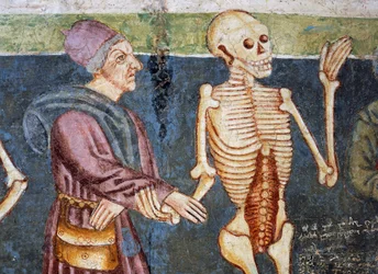 Kościół obronny w Hrastovlje, Kościół Trójcy Świętej, lekarz towarzyszący śmierci, Taniec śmierci (1490), fragment fresków Janeza Iz Kastvy, Słowenia