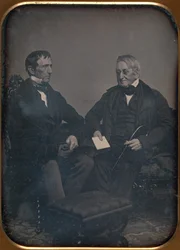 Dwóch starszych mężczyzn rozmawiających, ca. 1850.