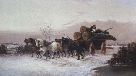 Wóz drzewny w śniegu