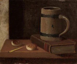 Kubek, książka, ciastka i zapałka