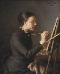 Malarka Agnes Paulsen, siostra artystki, przy jej sztalugach