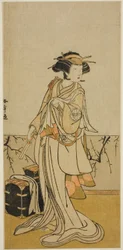 Aktor Segawa Yujiro I jako Osai, fryzjerka, w sztuce Kamuri Kotoba Soga no Yukari, wystawionej w Teatrze Ichimura w pierwszym miesiącu, 1776