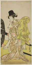 Aktor Yamashita Kinsaku II jako Tsukimasu, działając jako Sakura-maru, w sztuce Miya-bashira Iwao no Butai, wystawionej w Teatrze Morita w siódmym miesiącu 1773