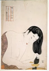 Kobieta maluje się. sd. Grafika autorstwa Utamaro KITAGAWA (1753-1806).