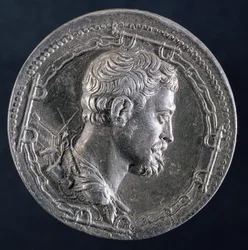 Rewers medalionu Andrei Dorii, przedstawiający artystę otoczonego kajdanami skazańca iz kambuzem w tle, ok. 1541 (srebro) (awers zob. 122337)