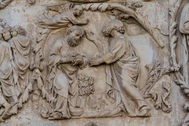 Gedeon wykręcający runo, fragment drzewa Jessego i proroctwa mesjańskie, Stories of Genesis, płaskorzeźby Lorenzo Maitani (przed 1275-1330), drugi filar, fasada katedry w Orvieto, Umbria, Włochy