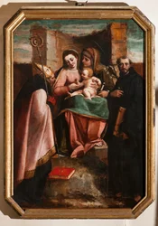 Genua, Duomo (katedra św. Wawrzyńca), wewnątrz baptysterium (dawniej kościół św. Jana Starego): „Madonna z Dzieciątkiem wśród św. Anny, św. Mikołaja z Bari i św. Mikołaja z Tolentino”, autorstwa Luca Cambiaso