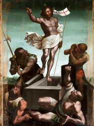 Zmartwychwstały Jezus Chrystus trzyma kij krzyżowy, na końcu którego unosi się biała flaga (sztandar) wybita czerwonym krzyżem. Obraz na drewnie Luca Cambiaso (1527-1585) XVI-wieczna Taggia, Santuario della Madonna miracolosa