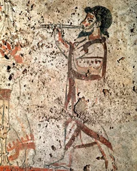 Muzyk grający na flecie. Fresk lukański z IV wieku p.n.e., z nekropolii w Paestum we Włoszech. Museo Nazionale Archeologico, Paestum