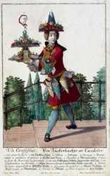 Cukiernik: młody mężczyzna trzymający tacę z cukierkami i słodyczami. Grawer Martina Engelbrechta (1684-1756) XVIII wiek. Paryż, Sztuka Dekoracyjna