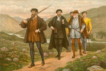 John Knox trzymający miecz przed George