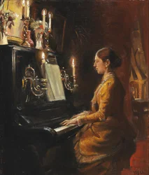 Anna przy pianinie.