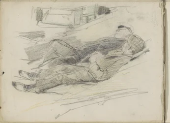 Dwóch mężczyzn leżących na plaży