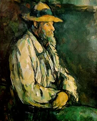 Portret Valliera w pozycji siedzącej