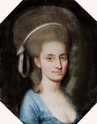 Portret kobiety w niebieskiej sukience.